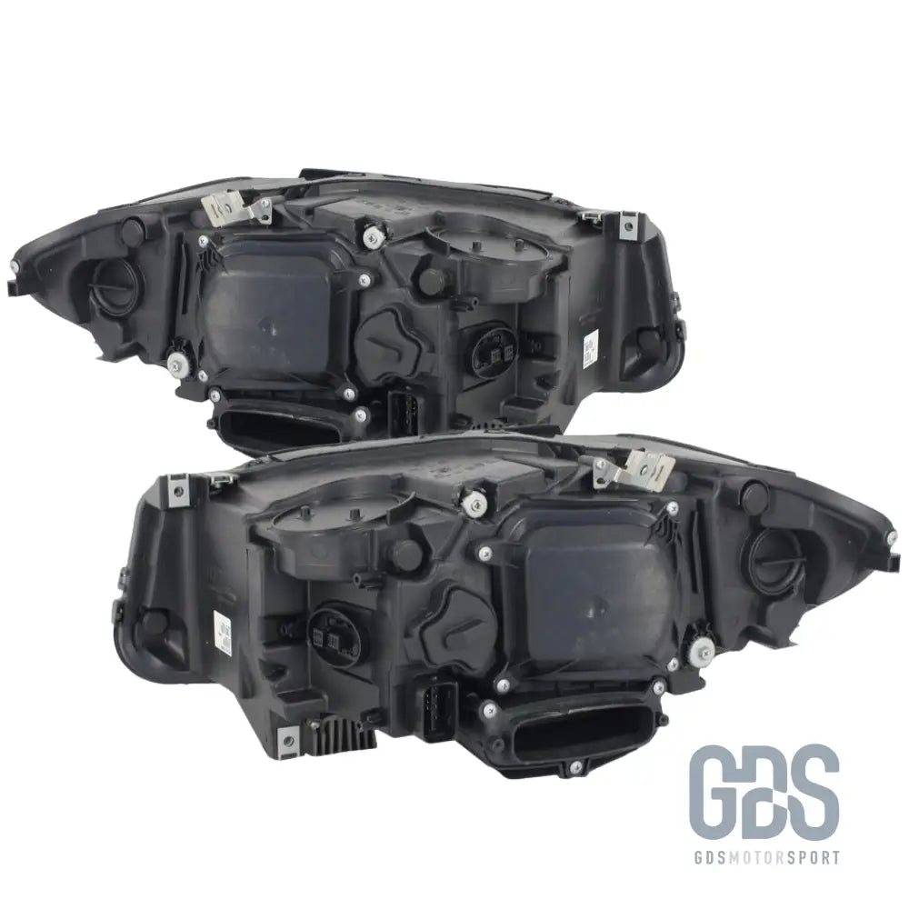 Phares avant bi-xenon fond noir angel eyes led pour bmw série 5 f10 / f11 phase 1 look lci