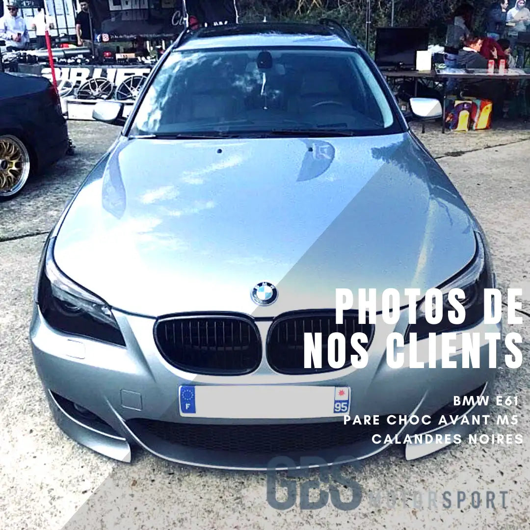 Berline BMW E61 argent avec calandre noire et design de pare-chocs avant.