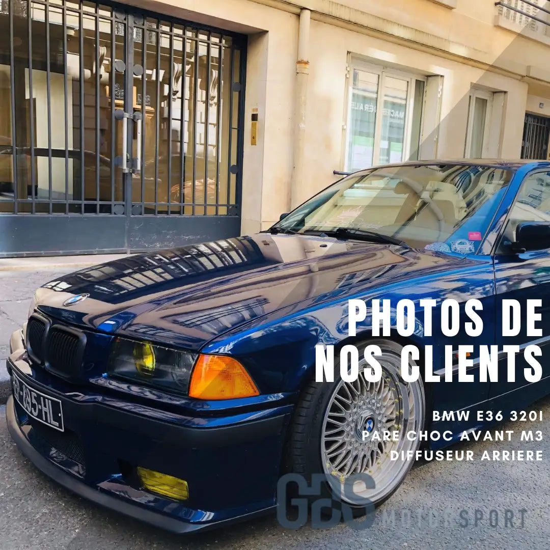 BMW e36 320i bleu avec pare-chocs avant M3 et diffuseur arrière.
