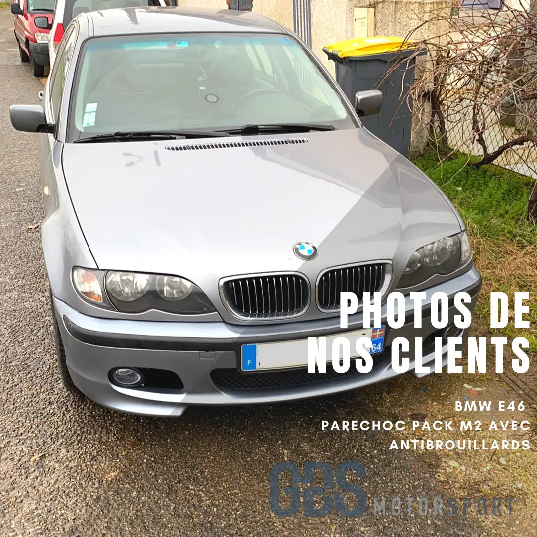 BMW E46 argent avec pack M2 et antibrouillards design.