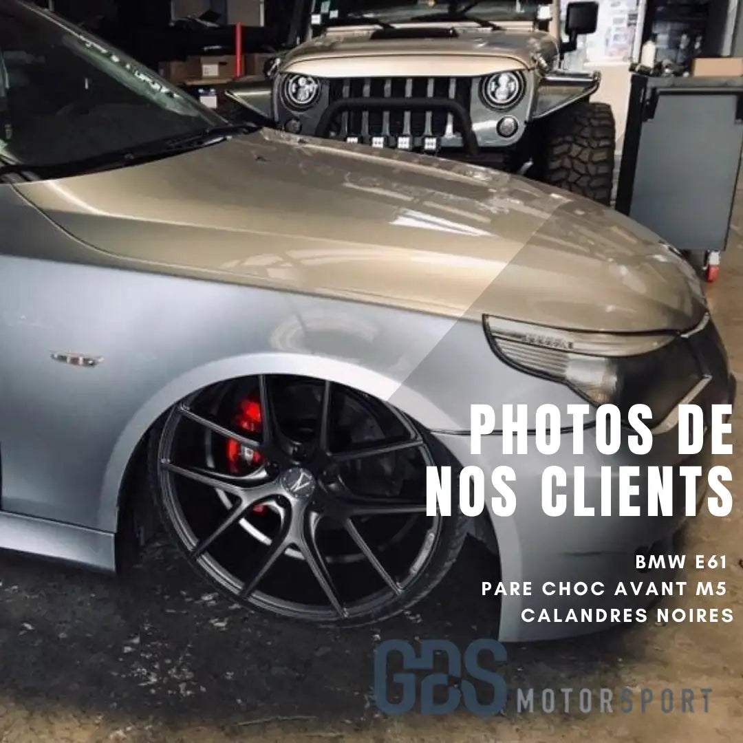 Pare-chocs avant en fibre de carbone BMW M5 2019 avec accents noirs et étriers de frein rouges.